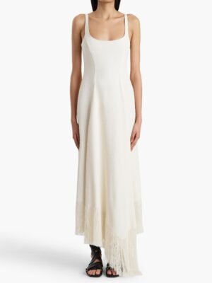 New fashionable and high-end Khaite dress, white long dress with tassel design at the hem.