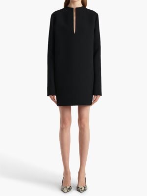 This new, stylish, high-end Khaite dress is available in black and white. It features a short design, a round neck, and long sleeves, made of polyester fiber.